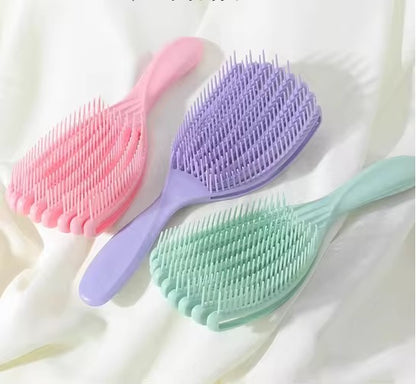 Hair detangling combs