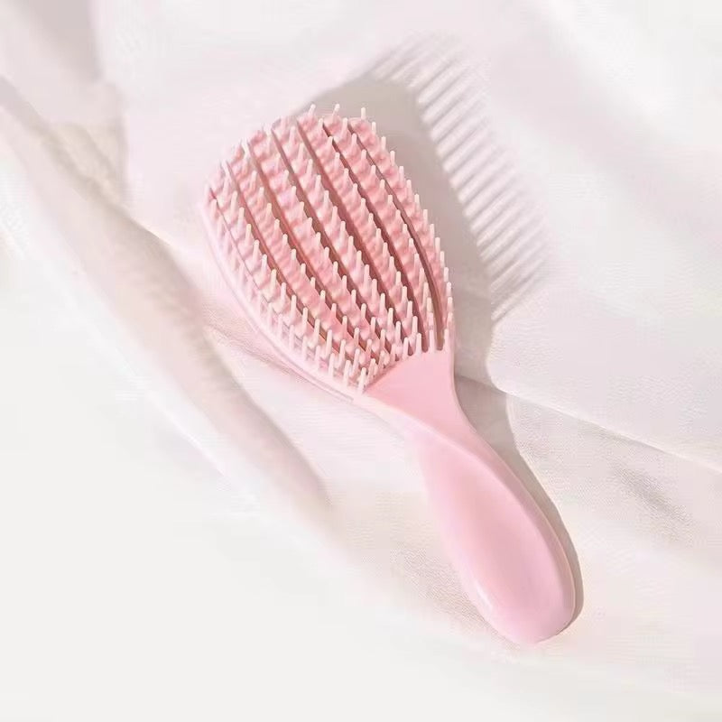 Hair detangling combs