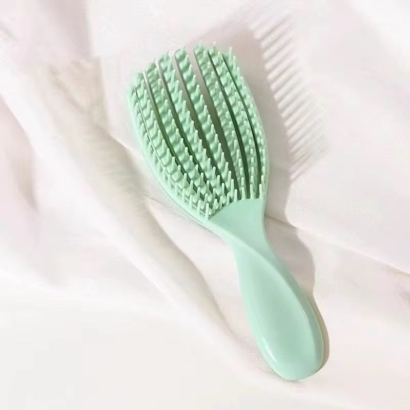 Hair detangling combs