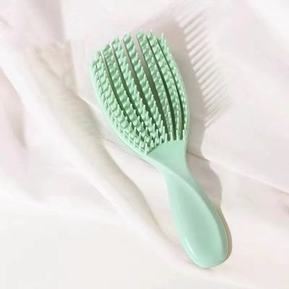 Hair detangling combs